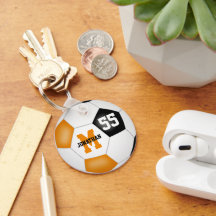 オレンジ色のブラックチームカラーズガールズスポーツ