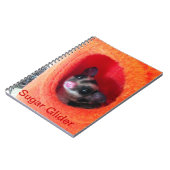 オレンジ色のベッドに砂糖ぶら下がったグライダー ノートブック (左側)