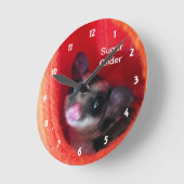 オレンジ色のベッドに砂糖ぶら下がったグライダー ラウンド壁時計 (傾斜)