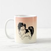 オレンジ色のマグカップに甘い小さな白黒の犬 コーヒーマグカップ (左)