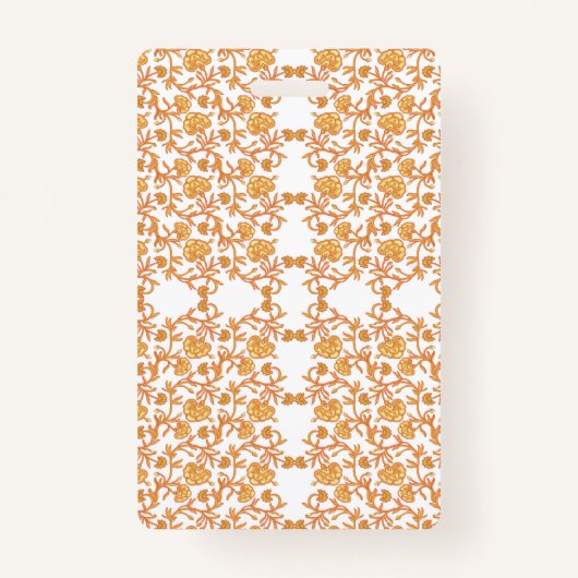 オレンジ色のモチフリースを使用した対称花パターン バッジ (正面)