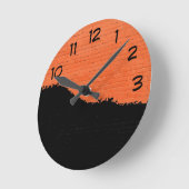 オレンジ色のレンガの壁(黒い剥離絵を描付き)  ラウンド壁時計 (傾斜)