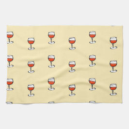 オレンジ色のワインをグラス キッチンタオル