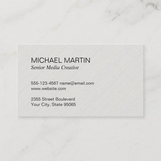 オレンジ色の企業の様式化されたグローブロゴ 名刺 (裏面)