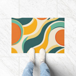 オレンジ色の円とカラーストリーム ドアマット