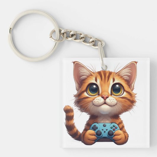 オレンジ色の子猫がゲームコントローラーを握る ゲーマー猫 キーホルダー (正面)