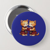 オレンジ色の子猫がバーンズ・ナイトを読んでいる 缶バッジ (正面&裏面)