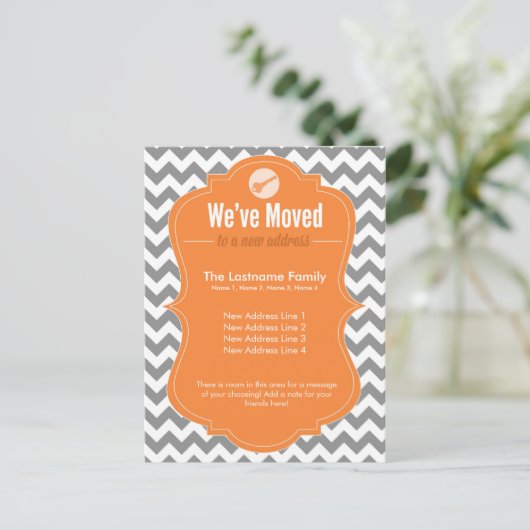 オレンジ色の引っ越しましたはがきの変更 案内ポストカード (スタンド正面)