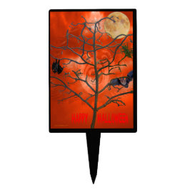 オレンジ色の怖いスカイケーキトッパーの間の死んだ木 ケーキピック