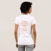 オレンジ色の文化的多様性啓発リボンTシャツ Tシャツ (裏面フル)