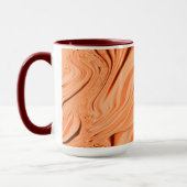オレンジ色の曲線状の茶色の円柱の濃淡 マグカップ (左)