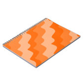 オレンジ色の波状海波のグラデーション ノートブック (左側)