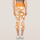 オレンジ色の白いジオメトリ高いウェイストキャプリス カプリレギンス (裏面)