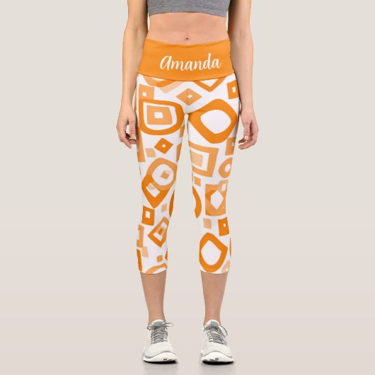 オレンジ色の白いジオメトリ高いウェイストキャプリス カプリレギンス (正面)