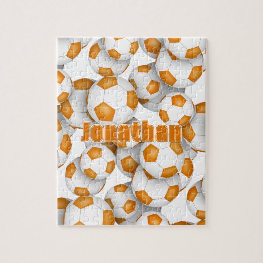 オレンジ色の白いチームカラーキッズサッカー ジグソーパズル (縦)