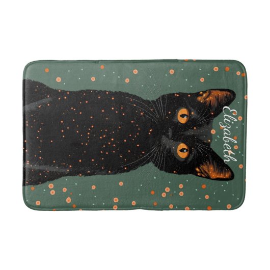 オレンジ色の目とグリッターで神秘的な黒猫 バスマット (正面)