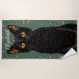 オレンジ色の目とグリッターで神秘的な黒猫 ビーチタオル