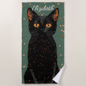 オレンジ色の目とグリッターで神秘的な黒猫 ビーチタオル (正面)
