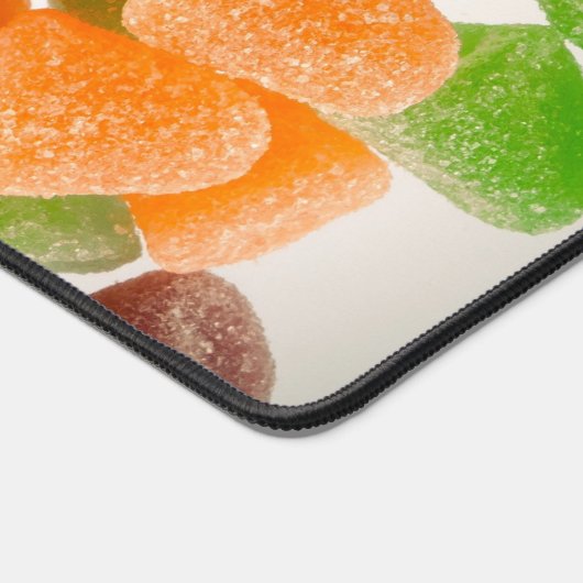 オレンジ色の緑色の赤いガム飴に砂糖を振りかけたもの デスクマット (コーナー)