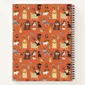 オレンジ色の背景の犬のパターン。 ノートブック (裏面)