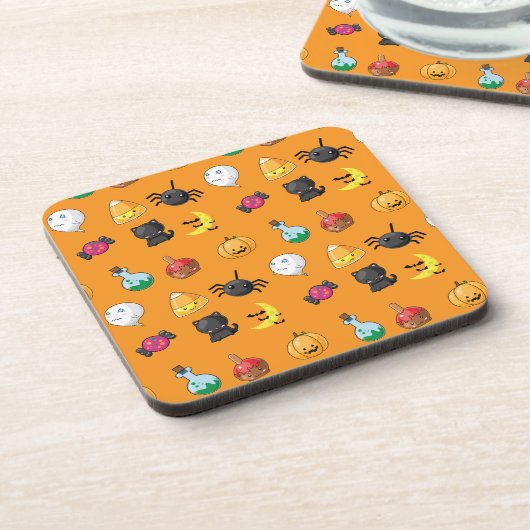オレンジ色の背景を持つ可愛いハロウィンパターン コースター (左側)