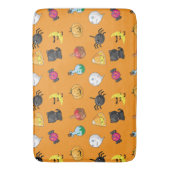 オレンジ色の背景を持つ可愛いハロウィンパターン バスマット (正面縦)