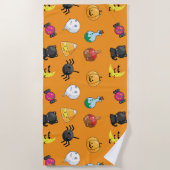 オレンジ色の背景を持つ可愛いハロウィンパターン ビーチタオル (正面)