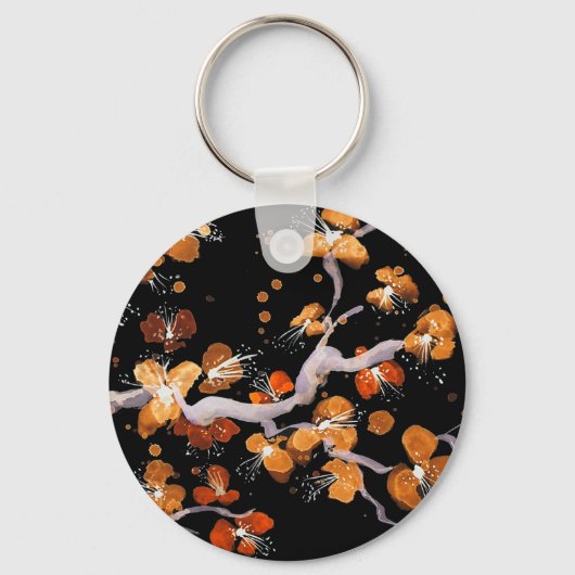 オレンジ色の花が黒 キーホルダー (正面)