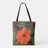 オレンジ色の花のクローズアップ トートバッグ (裏面)