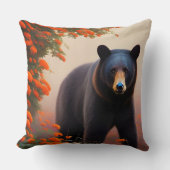 オレンジ色の花を咲かせた黒熊 クッション (正面)
