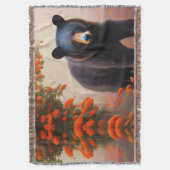オレンジ色の花を咲かせた黒熊 スローブランケット (正面縦)
