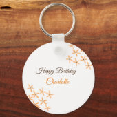 オレンジ色の茶色の花のハッピーバースデー追加の名前のかわいこちゃん キーホルダー (正面)