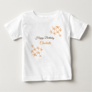 オレンジ色の茶色の花のハッピーバースデー追加の名前のかわいこちゃん ベビーTシャツ