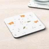 オレンジ色の虎猫と葉のパターン コースター (左側)