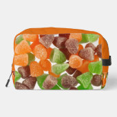 オレンジ色の赤いガムキャンディを振りかける砂糖モノグラム ドップキット (裏面)