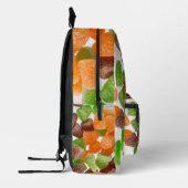 オレンジ色の赤いガムキャンディを振りかける砂糖モノグラム プリントバックパック (左)