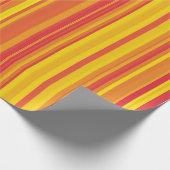 オレンジ色の赤い黄色のストライプ ラッピングペーパー (角)