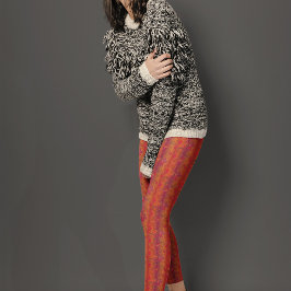 オレンジ色の陰影の背景のフラワーパターン レギンス