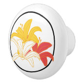 オレンジ色の黄色の白い花の上に白 セラミックノブ (右)