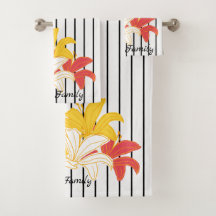 オレンジ色の黄色の白い花オン白黒ストライプ