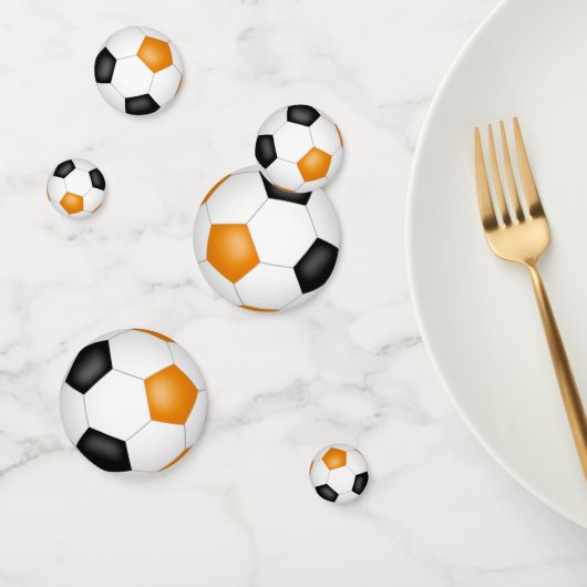 オレンジ色の黒いサッカーボール子供たち10代のスポーツパーティー コンフェッティ (グループ)