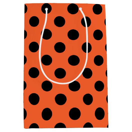 オレンジ色の黒い水玉模様 ミディアムペーパーバッグ (正面)