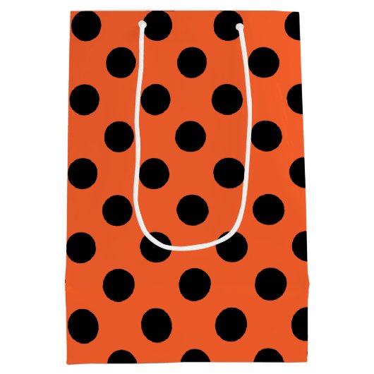 オレンジ色の黒い水玉模様 ミディアムペーパーバッグ (裏面)
