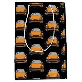 オレンジ電気自動車SUV車の黒の背景 ミディアムペーパーバッグ