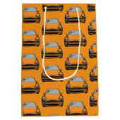 オレンジ電気自動車SUV車オレンジ色の背景 ミディアムペーパーバッグ (裏面)