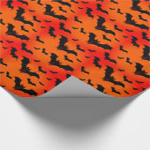 オレンジ飛んでいる色の背景の漫画こうもり ラッピングペーパー (角)