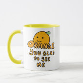 オレンジ飲むこと嬉しい マグカップ (左)