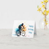 オレンジ、ティール(緑がかった色)、および黒のサイクリスト誕生日カード カード (黄色い花)
