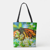 オレンジ(昆虫)オオカバマダラ、モナークバタフライホワイトフラワーフォトはっきりした トートバッグ (裏面)