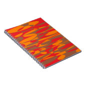 オレンジ、赤、茶色のエリプティカル ノートブック (右側)